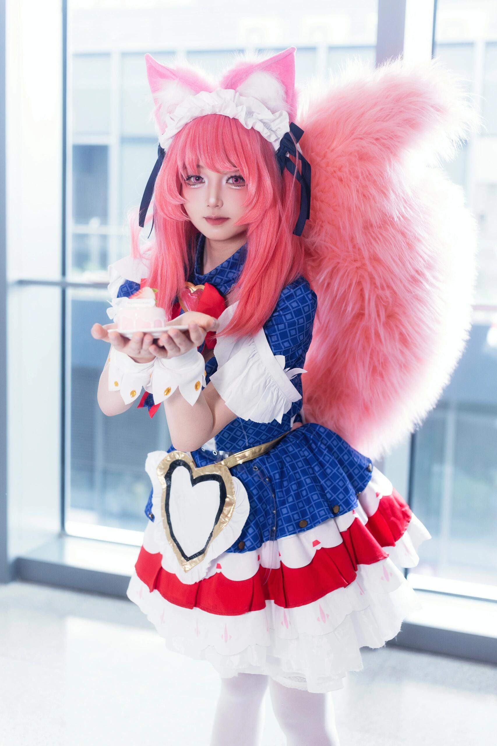 Mesmerizing Daji cosplay bringing the Nine-Tailed Fox to life with stunning beauty and seductive charm. This enchanting cosplayer captures the mystical allure of one of Arena of Valor's most captivating characters. Her bewitching poses and gorgeous outfit will leave you spellbound! - 4