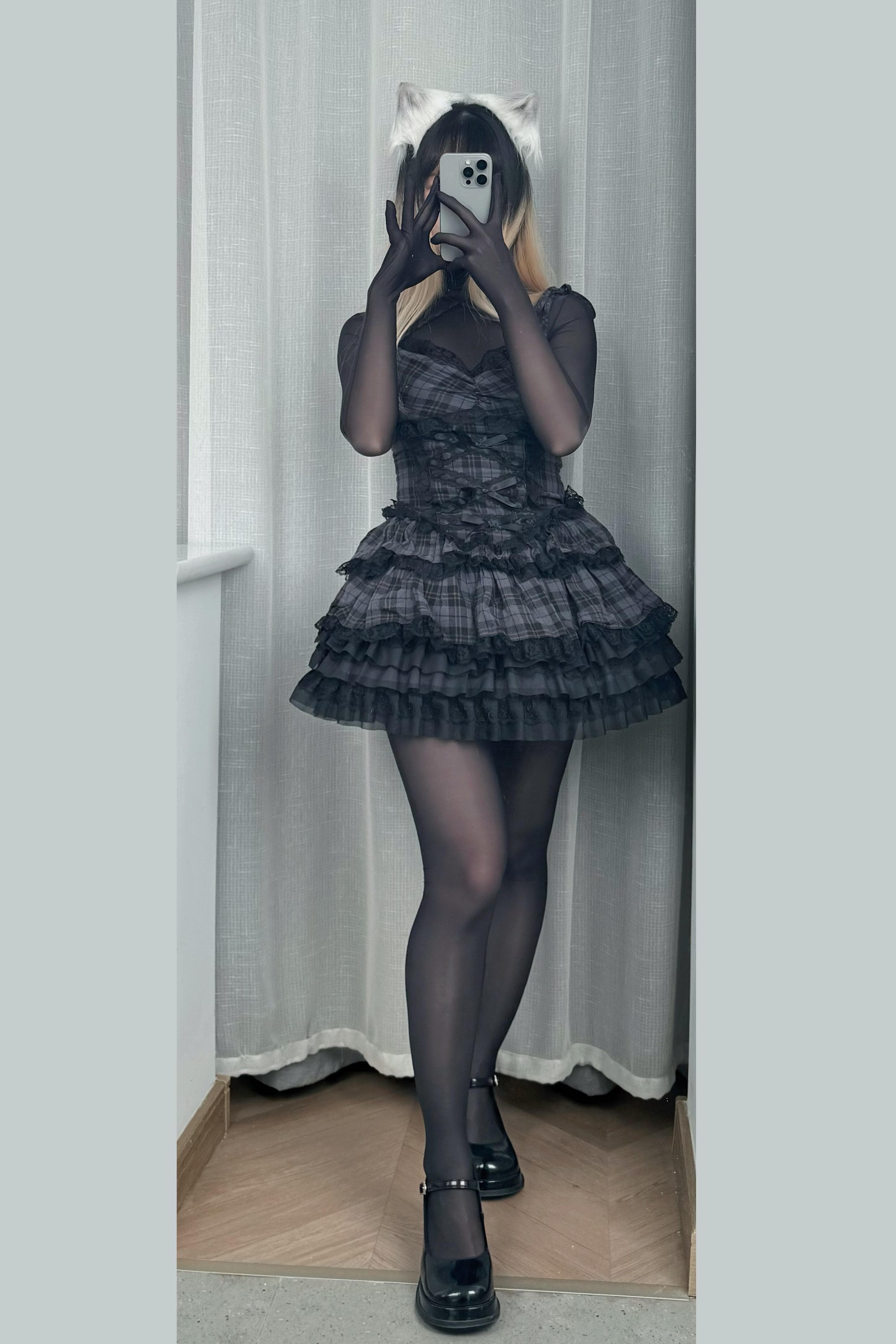 Captivating black ensemble with sleek thigh-high stockings that command attention. The way these stockings hug every curve is pure perfection—a stunning display of confidence and allure! - 1