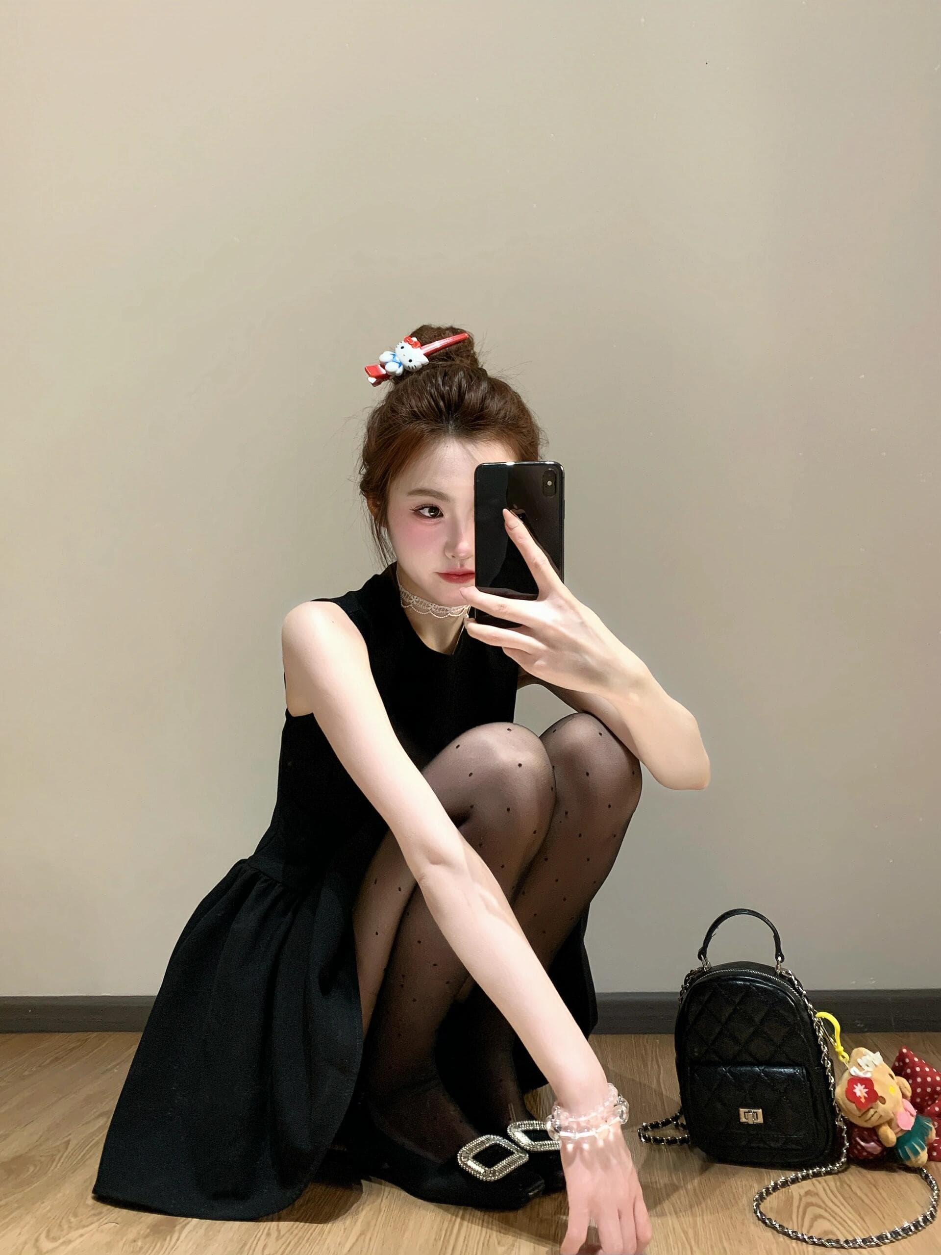 Exquisite black outfit with elegant thigh-high stockings that create a stunning silhouette. Every curve is perfectly showcased—pure sophistication with an irresistible edge! - 1